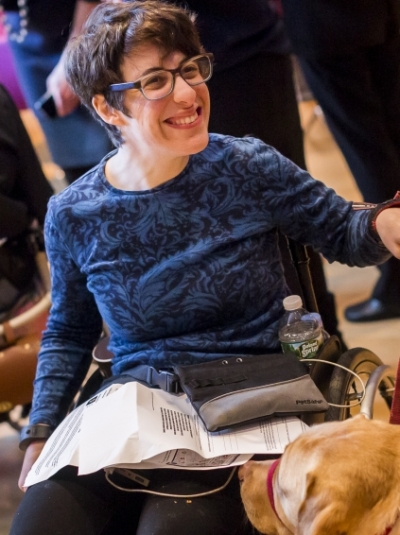 woman in a wheelchair enjoying a Smithsonian event